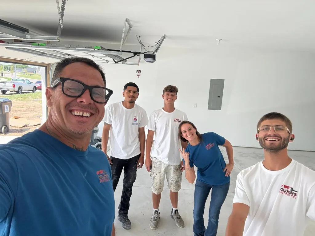 Bolden’s Painting | Residential Interior Repainting Bolden’s Painting crew inside a garage with white walls.